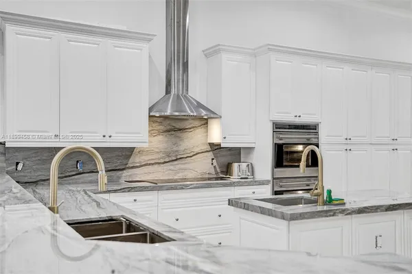 a bedroom with double bed and a night stand