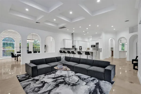 a bathroom with a sink toilet and a mirror