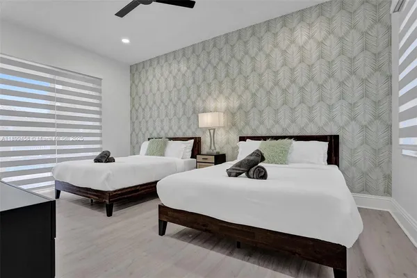 a room with toys and wall painting