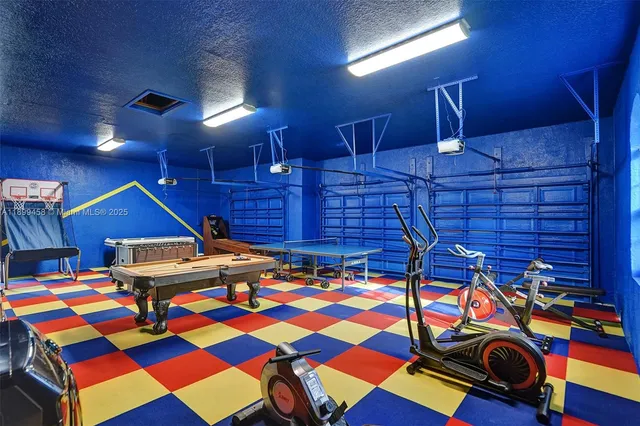 a swimming pool with outdoor seating