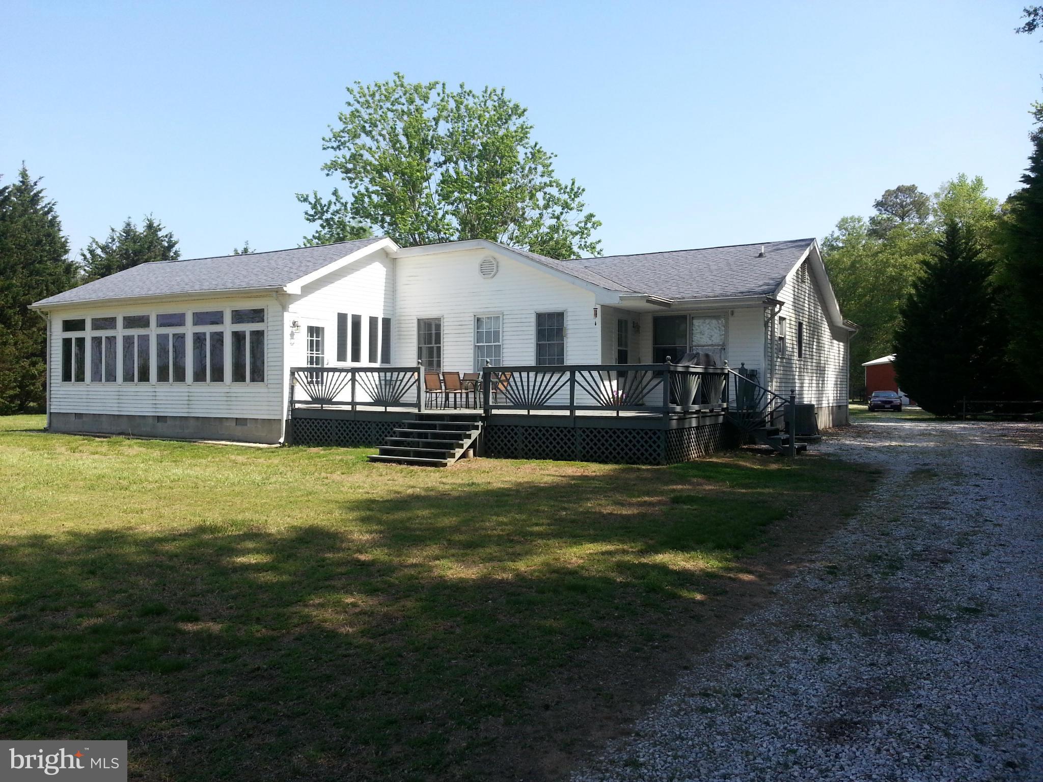 4174 Griffith Neck Road Cambridge, MD 21613 - Photo 2 of 25 Generous deck for entertaining