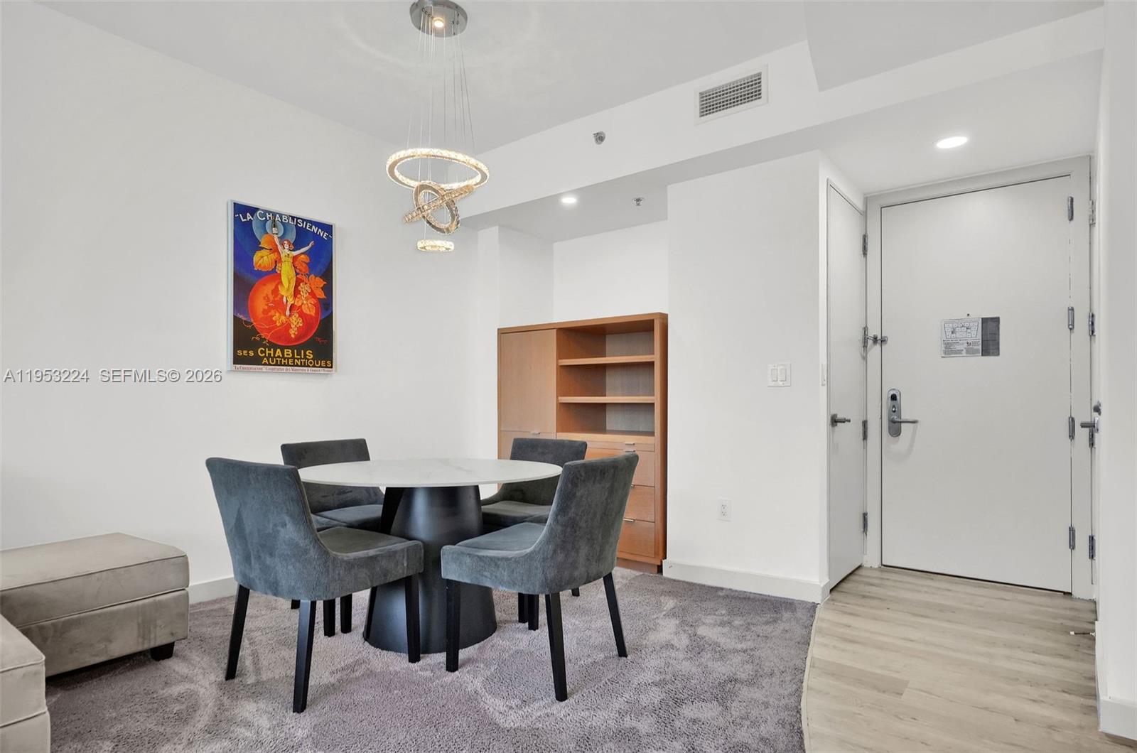 1395 Brickell Avenue, Unit 3311 Miami, FL 33131 - Photo 18 of 40 a view of a dining room with furniture