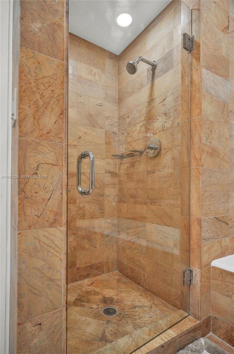 1395 Brickell Avenue, Unit 3311 Miami, FL 33131 - Photo 30 of 40 a bathroom with a shower