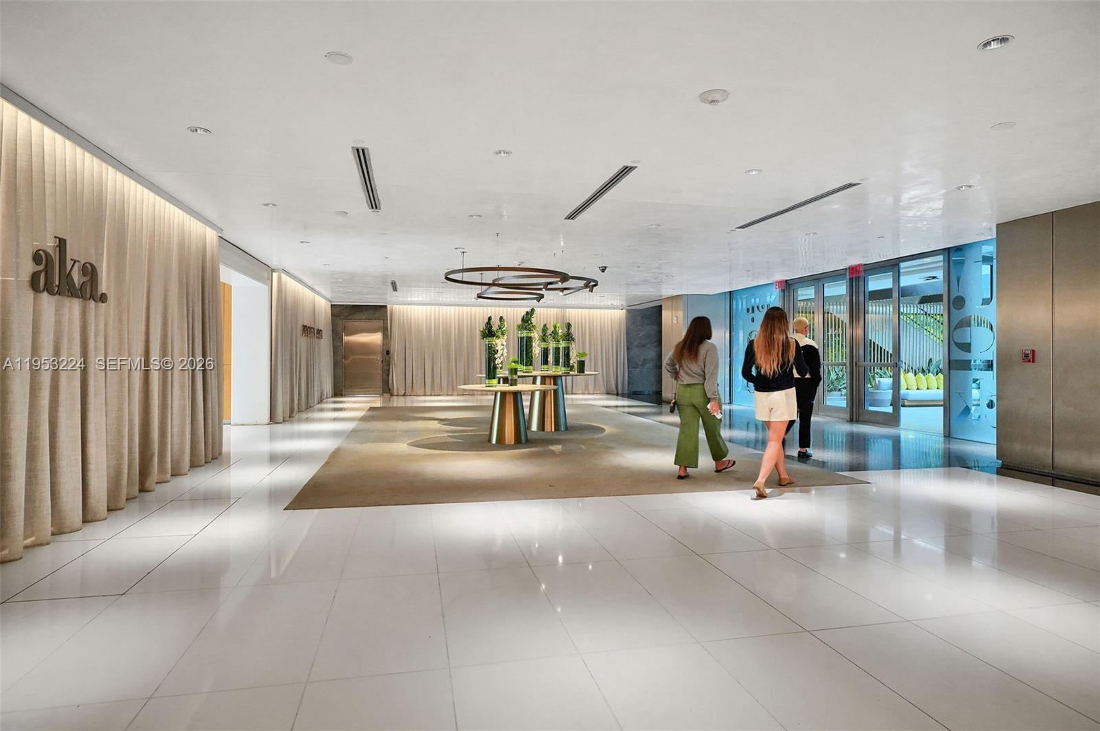 1395 Brickell Avenue, Unit 3311 Miami, FL 33131 - Photo 32 of 40 a view of a hall with gym equipment