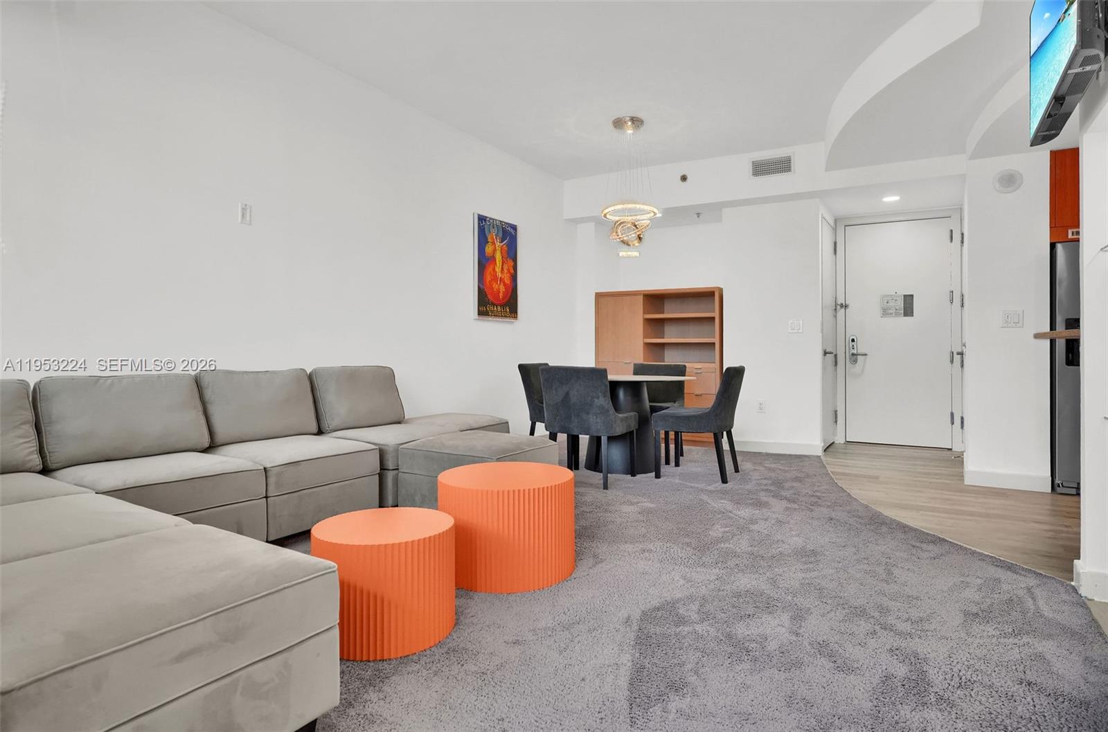 1395 Brickell Avenue, Unit 3311 Miami, FL 33131 - Photo 5 of 40 a living room with furniture and a area