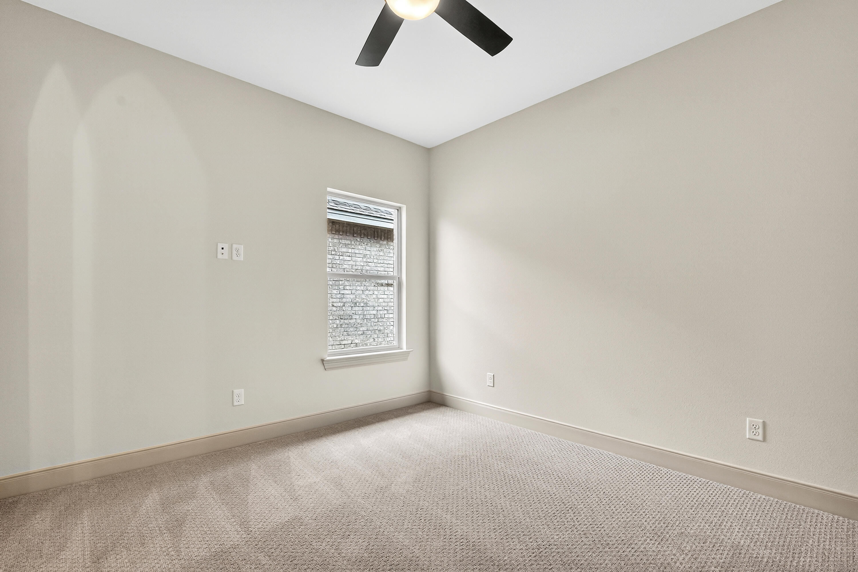 3627 119th Street Lubbock, TX 79423 - Photo 27 of 37 an empty room with ceiling fan and window