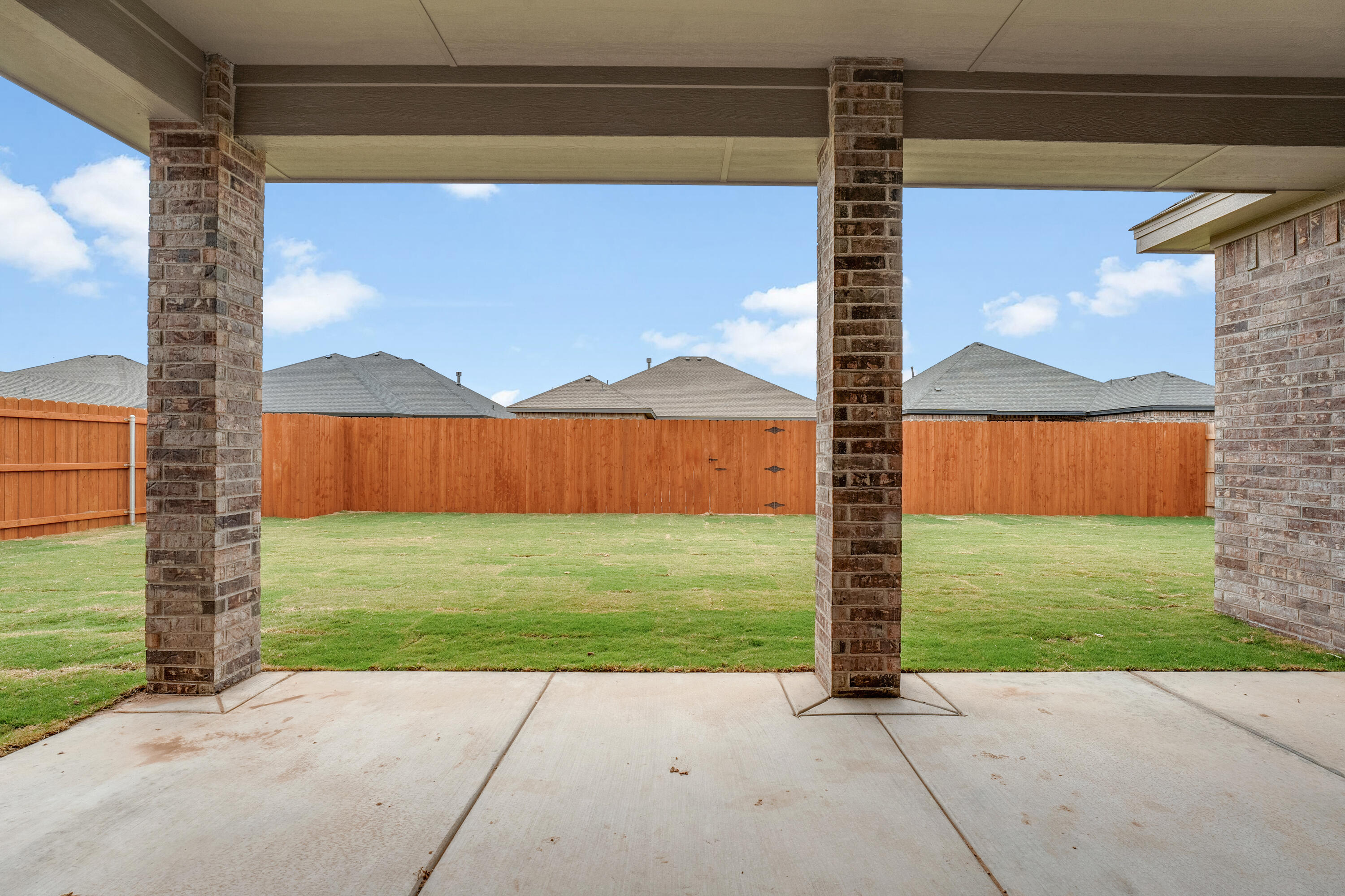 3627 119th Street Lubbock, TX 79423 - Photo 33 of 37 a view of backyard with potted plants