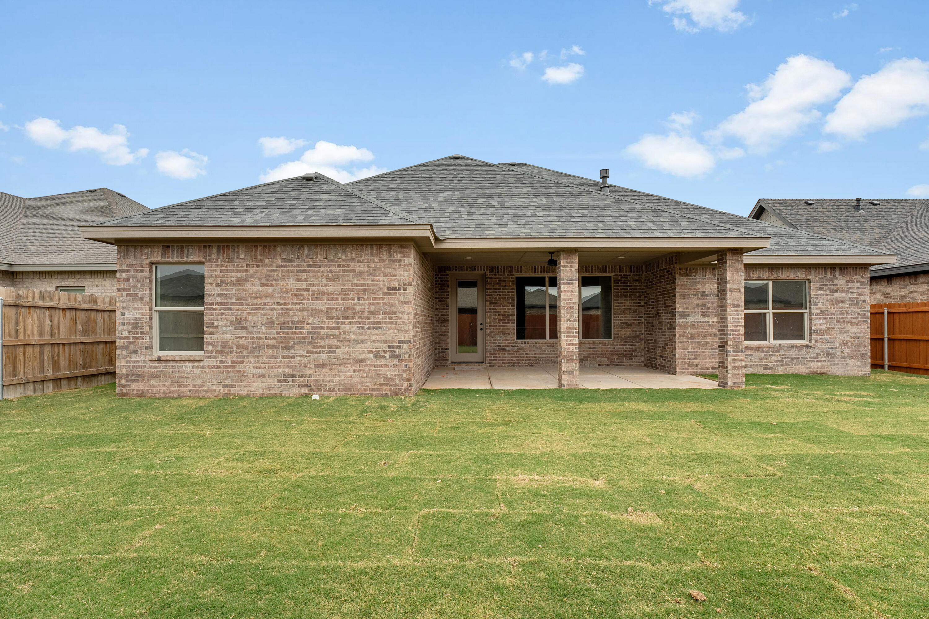 3627 119th Street Lubbock, TX 79423 - Photo 36 of 37 a view of a house with a garden and yard