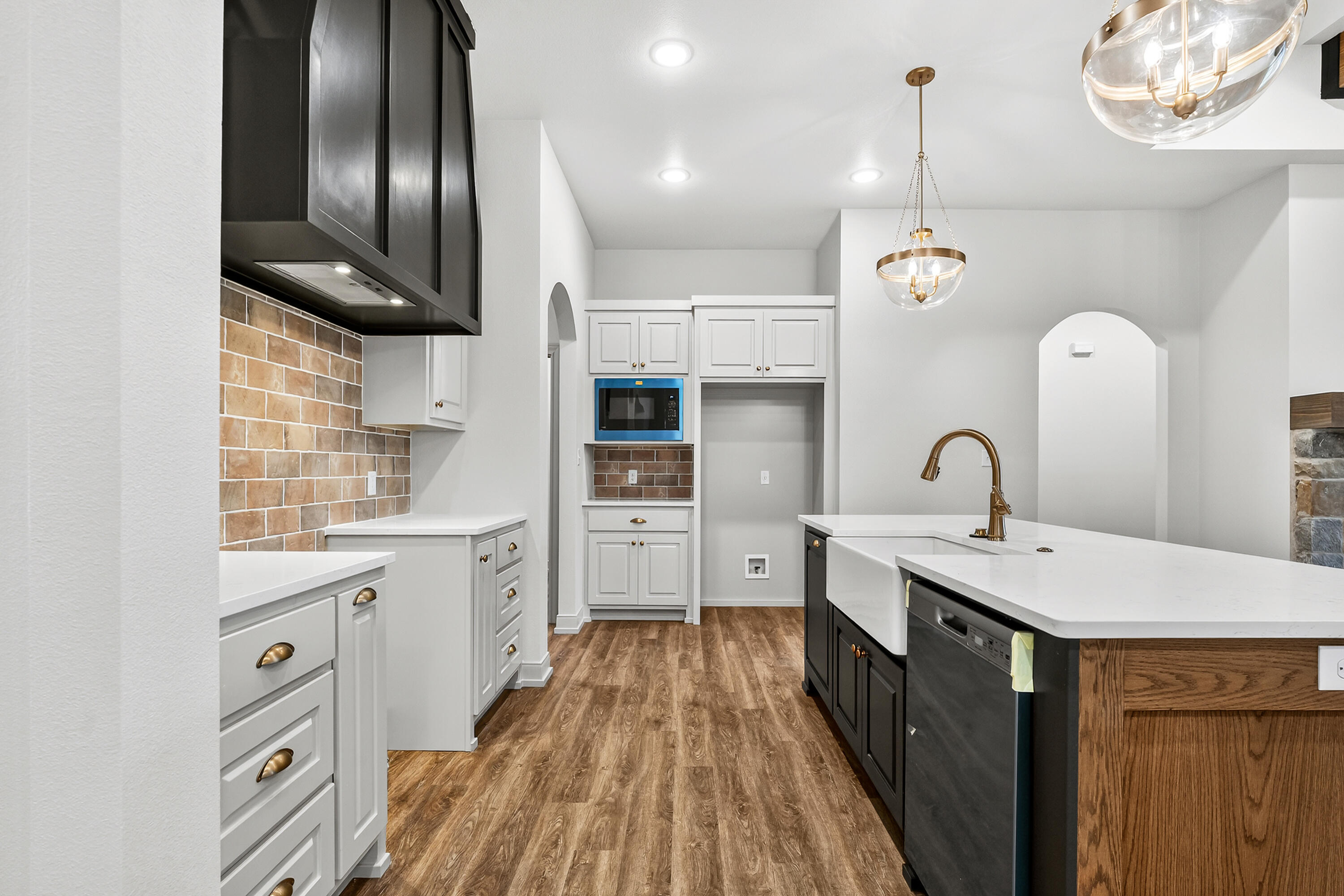 3627 119th Street Lubbock, TX 79423 - Photo 7 of 37 a kitchen with stainless steel appliances a sink stove and cabinets