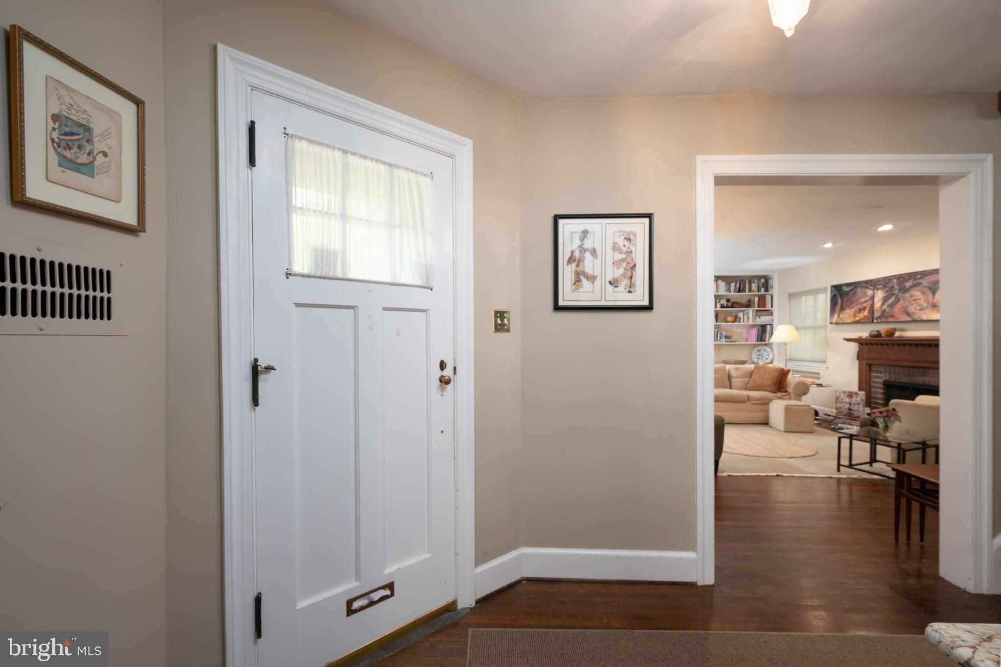 409 East Waverly Road Wyncote, PA 19095 - Photo 9 of 36 a view of a hallway with workspace and a window