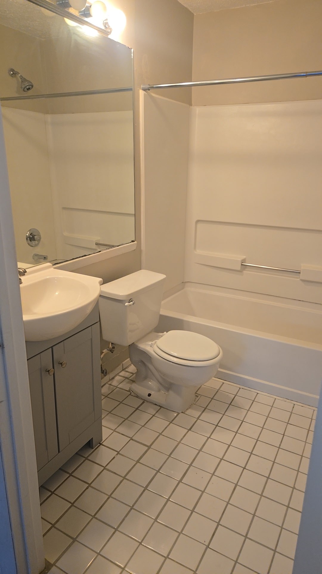 1245 Old Lascassas Road, Unit C Murfreesboro, TN 37130 - Photo 14 of 15 a bathroom with a sink a toilet and shower