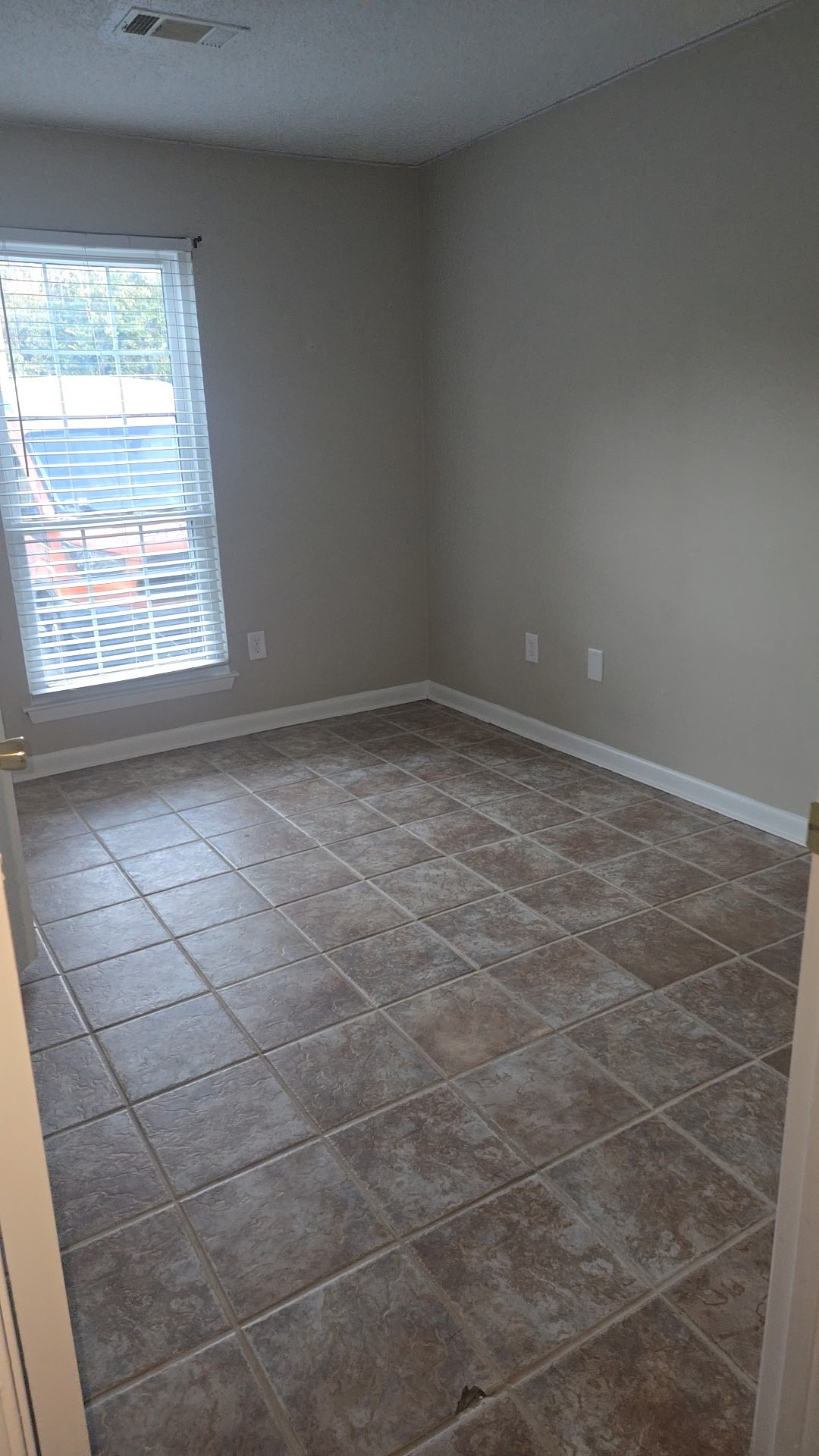 1245 Old Lascassas Road, Unit C Murfreesboro, TN 37130 - Photo 9 of 15 a view of empty room with window