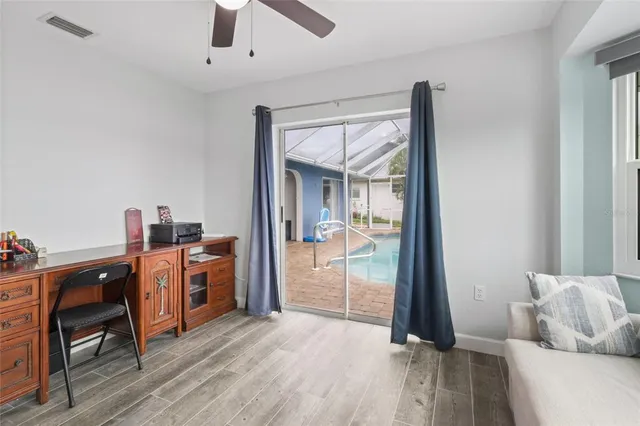 a room with furniture and a wooden floor