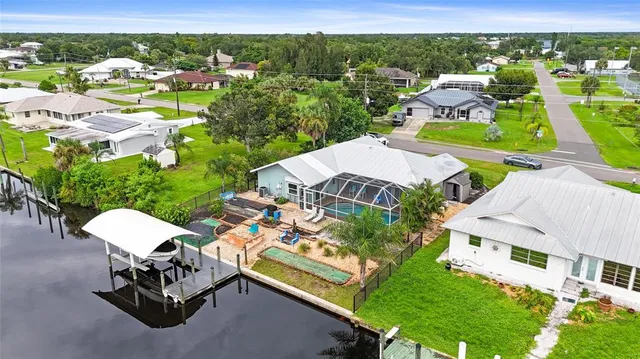 an aerial view of a house with a garden
