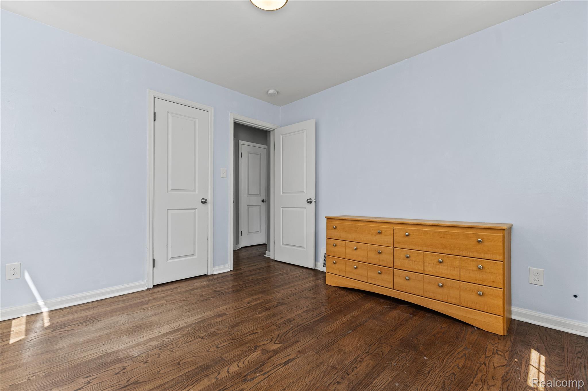 26508 Five Mile Road Redford, MI 48239 - Photo 23 of 41 Wood-finish flooring with light blue walls and white trim