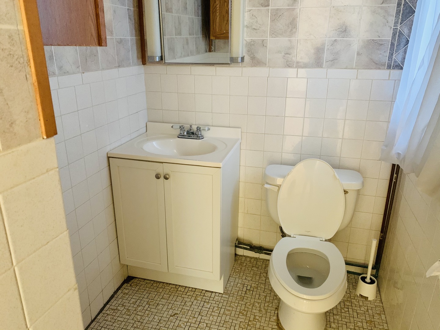 3620 148th Street Midlothian, IL 60445 - Photo 15 of 20 a bathroom with a sink and a mirror
