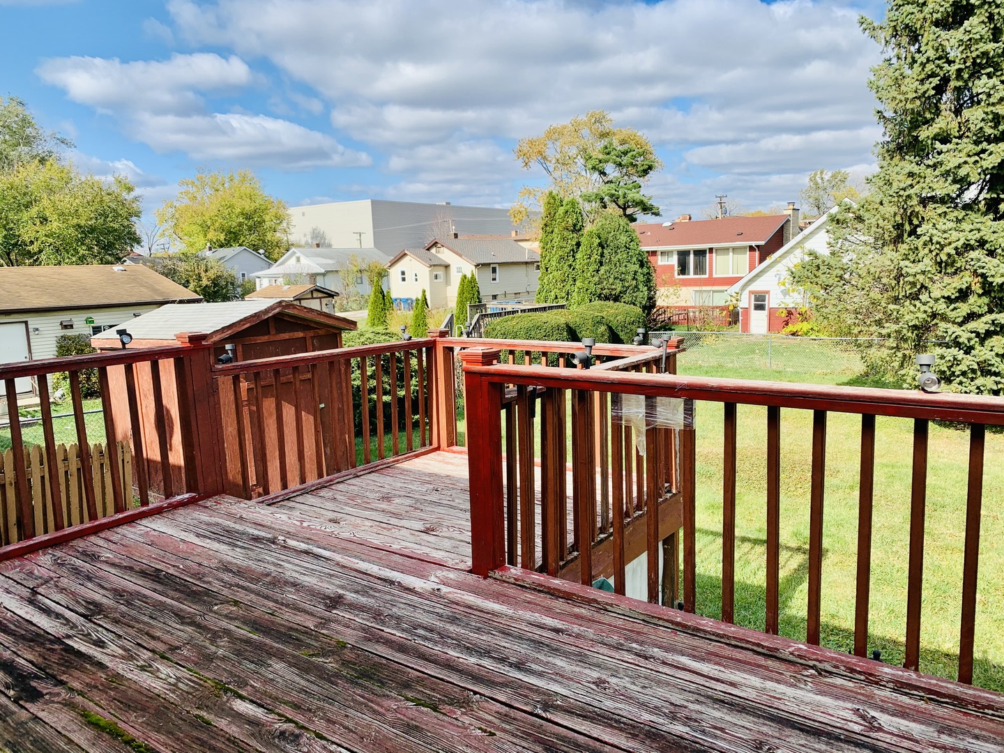 3620 148th Street Midlothian, IL 60445 - Photo 16 of 20 a balcony with wooden floor table and chairs