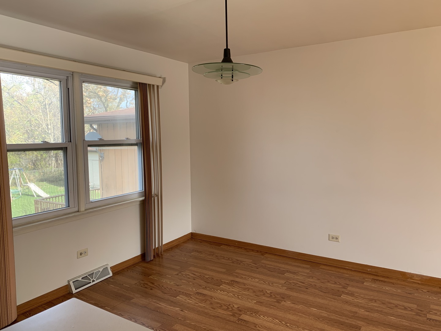 3620 148th Street Midlothian, IL 60445 - Photo 6 of 20 a view of a room with wooden floor and windows