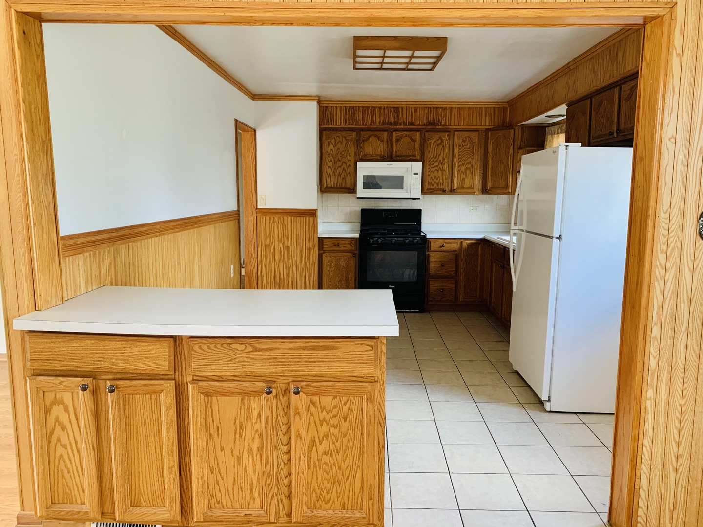 3620 148th Street Midlothian, IL 60445 - Photo 7 of 20 a kitchen with stainless steel appliances a refrigerator and cabinets