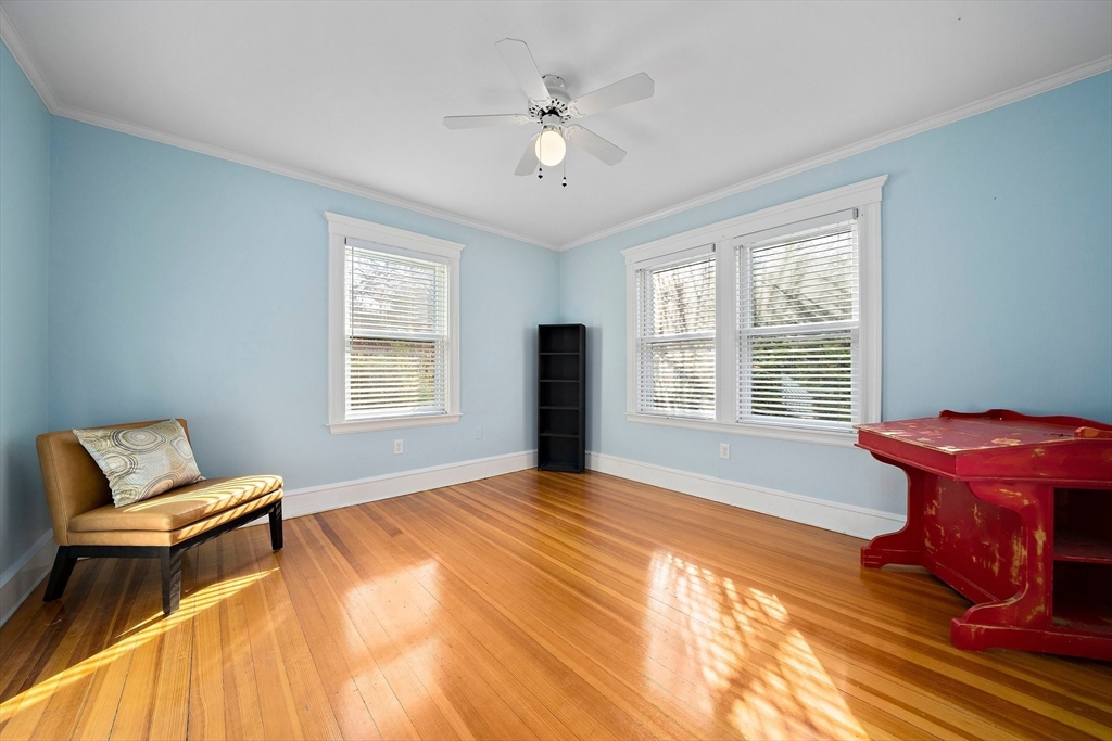 11 Gordon Road Needham, MA 02492 - Photo 14 of 42 a bedroom with a bed and wooden floor