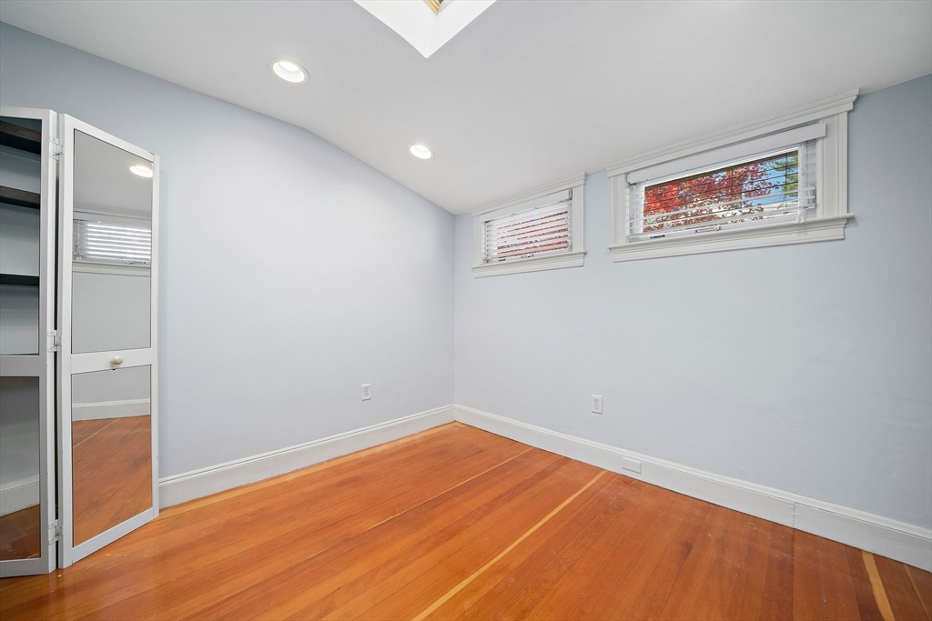 11 Gordon Road Needham, MA 02492 - Photo 30 of 42 a view of empty room with wooden floor