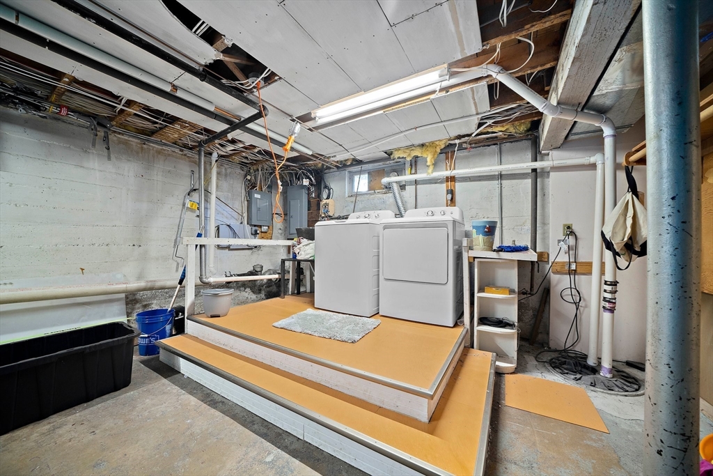 11 Gordon Road Needham, MA 02492 - Photo 34 of 42 a utility room with dryer and washer