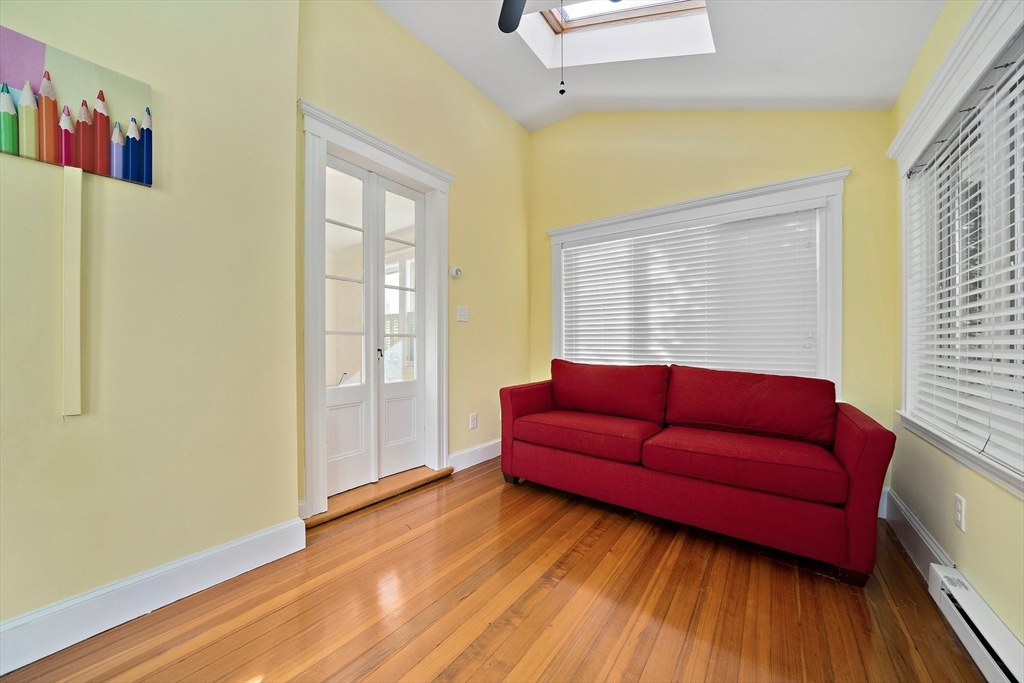 11 Gordon Road Needham, MA 02492 - Photo 10 of 42 a living room with furniture and wooden floor