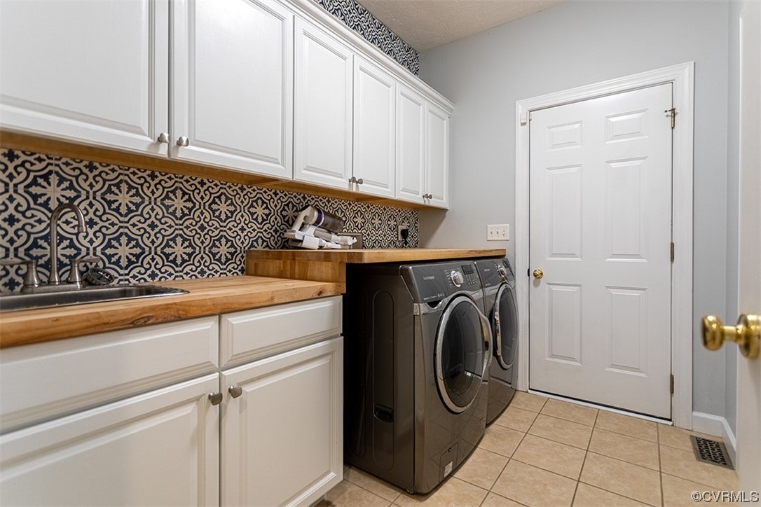 11570 Royal Lane Providence Forge, VA 23140 - Photo 14 of 49 a utility room with dryer and washer