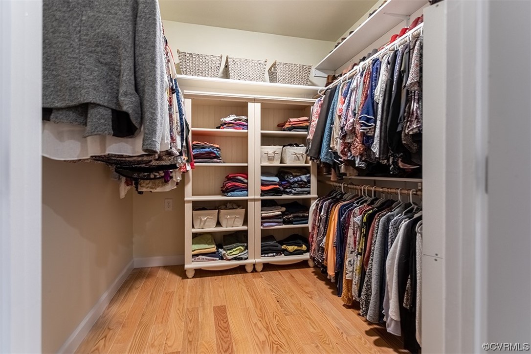11570 Royal Lane Providence Forge, VA 23140 - Photo 18 of 49 a view of walk in closet with clothes and shoes