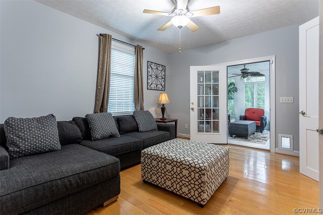 11570 Royal Lane Providence Forge, VA 23140 - Photo 24 of 49 a living room with furniture or couch and a chandelier