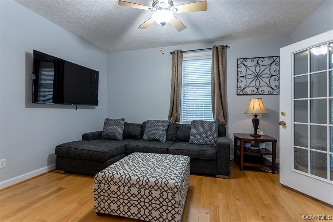 11570 Royal Lane Providence Forge, VA 23140 - Photo 25 of 49 a living room with furniture and a flat screen tv
