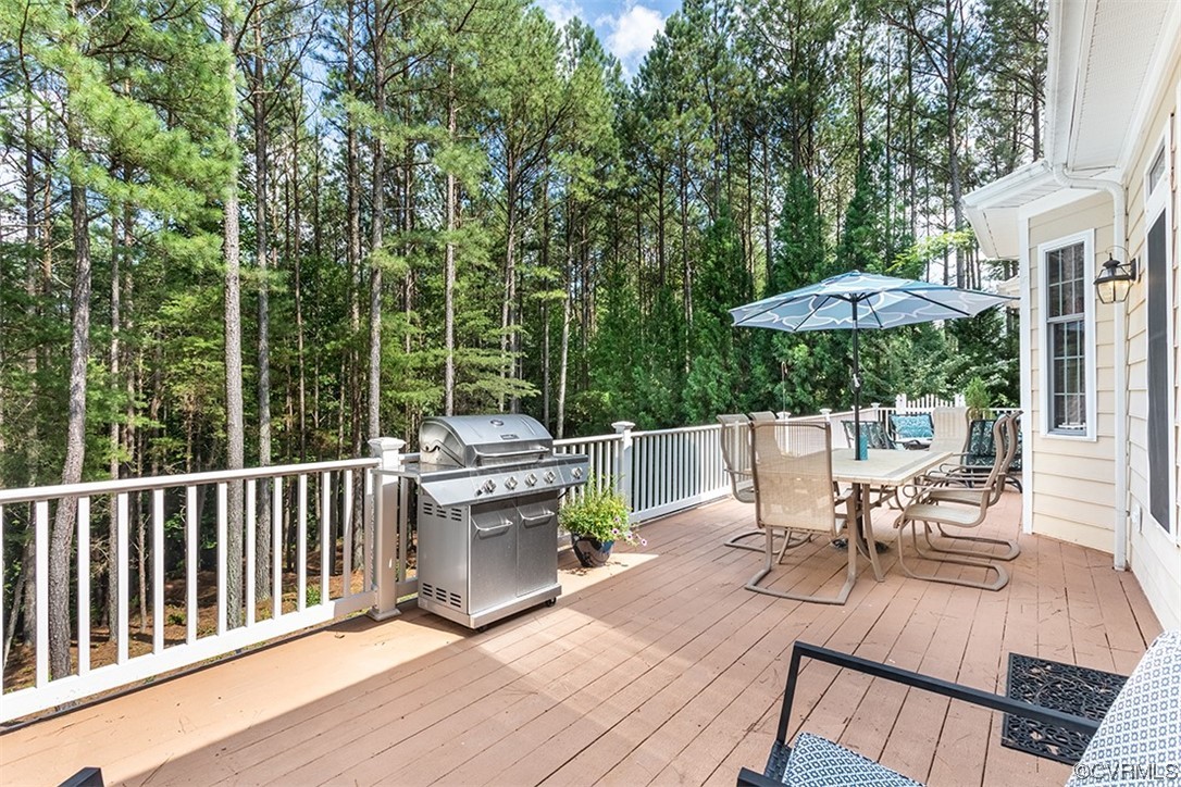 11570 Royal Lane Providence Forge, VA 23140 - Photo 28 of 49 a view of balcony with outdoor seating and wooden floor
