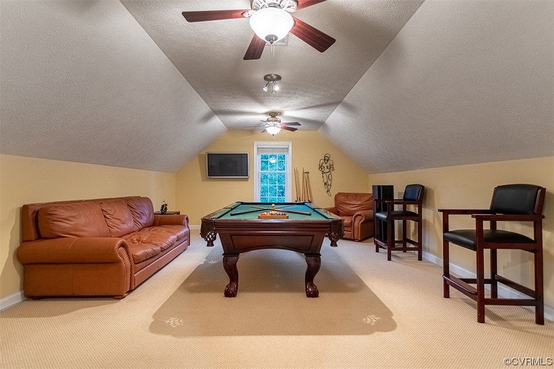 11570 Royal Lane Providence Forge, VA 23140 - Photo 32 of 49 a living room with furniture and a chandelier