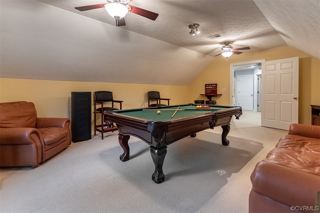 11570 Royal Lane Providence Forge, VA 23140 - Photo 33 of 49 a living room with furniture and a chandelier