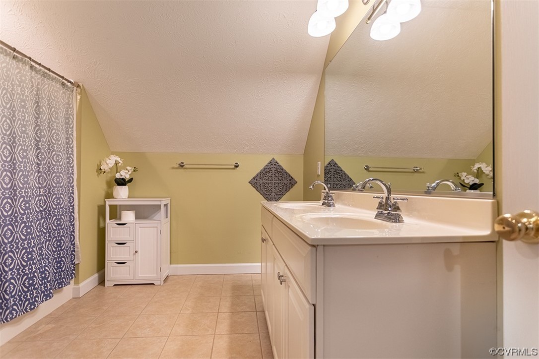 11570 Royal Lane Providence Forge, VA 23140 - Photo 34 of 49 a bathroom with a sink and a mirror