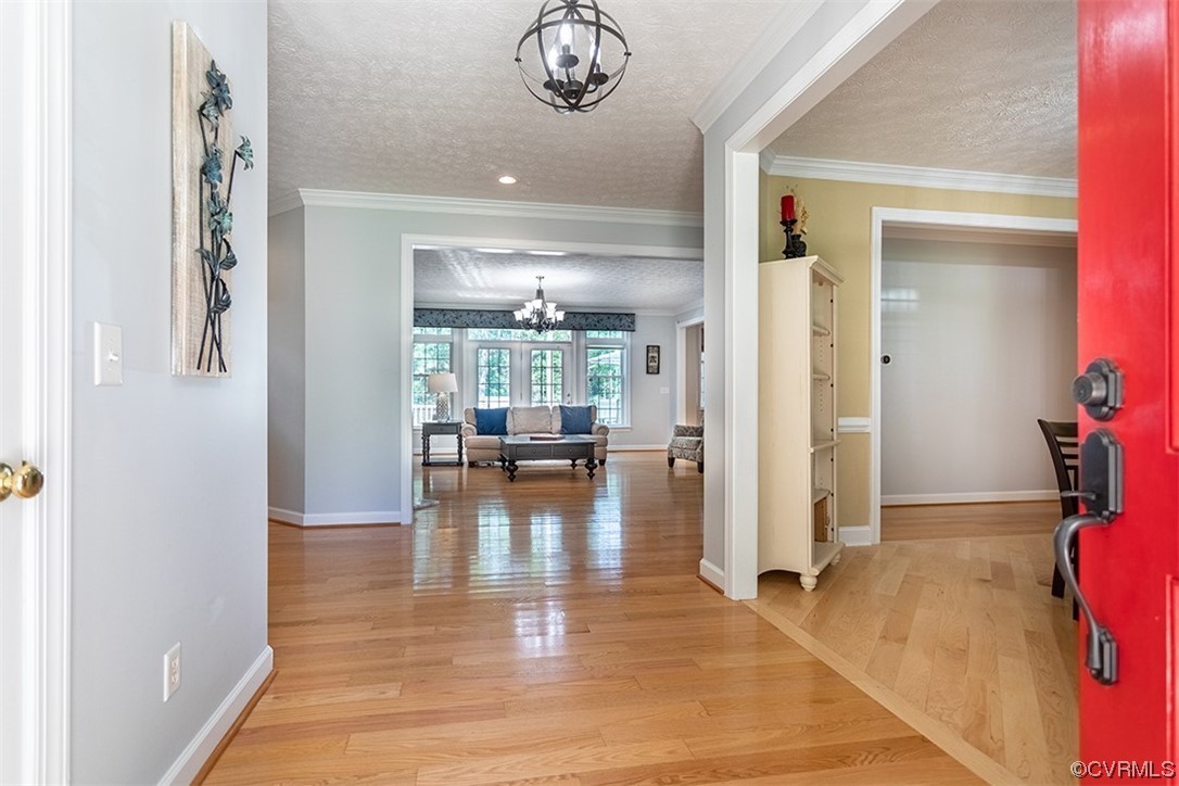 11570 Royal Lane Providence Forge, VA 23140 - Photo 4 of 49 a view of dining room with wooden floor