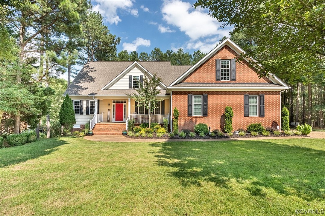 11570 Royal Lane Providence Forge, VA 23140 - Photo 41 of 49 a front view of a house with a yard patio and green space