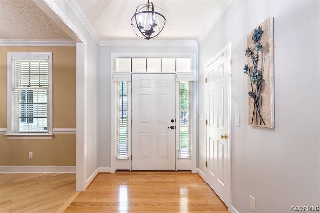11570 Royal Lane Providence Forge, VA 23140 - Photo 5 of 49 a view of a room with wooden floor and windows