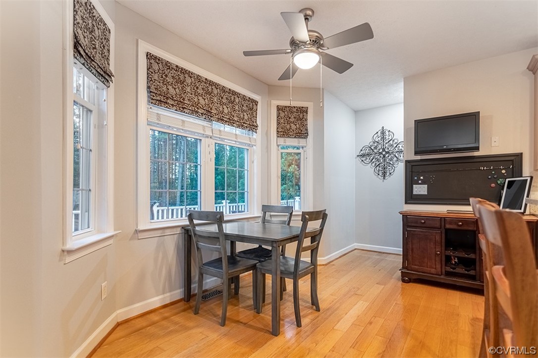 11570 Royal Lane Providence Forge, VA 23140 - Photo 10 of 49 a view of a dining room with furniture window and wooden floor