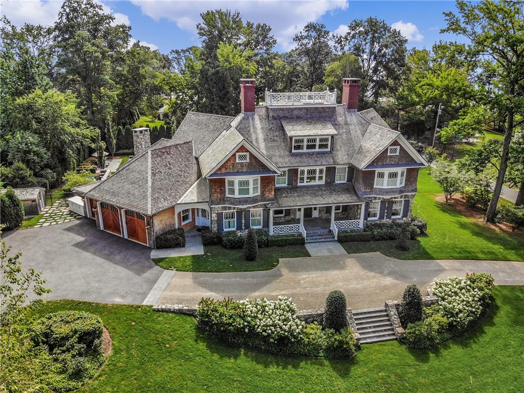 Milton Point colonial built in 2016 with 6 bedrooms and 6.2 baths set on 1.25 level, manicured acres with 70' pool.