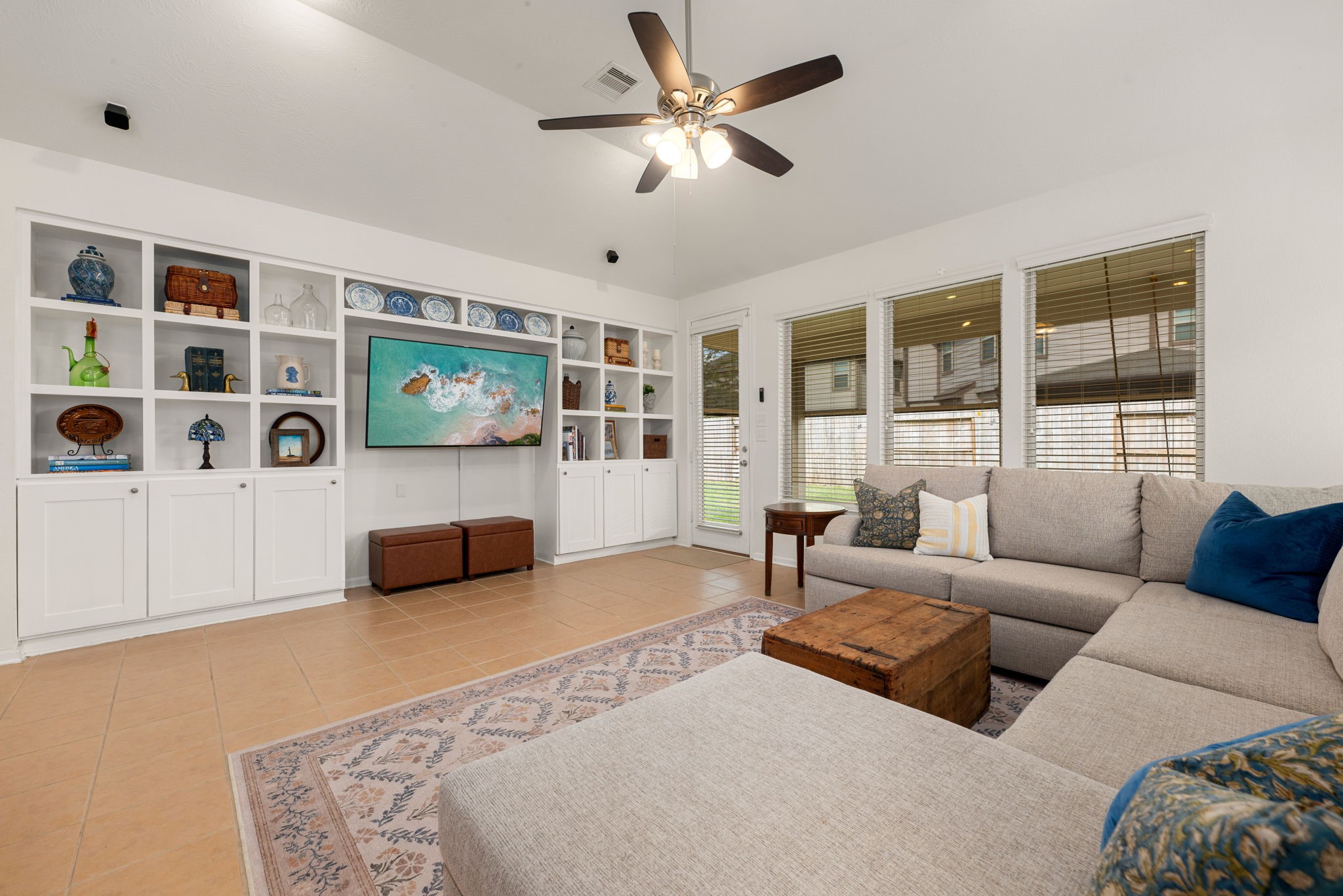 24014 Adobe Ridge Lane Katy, TX 77493 - Photo 13 of 45 a living room with furniture and a flat screen tv