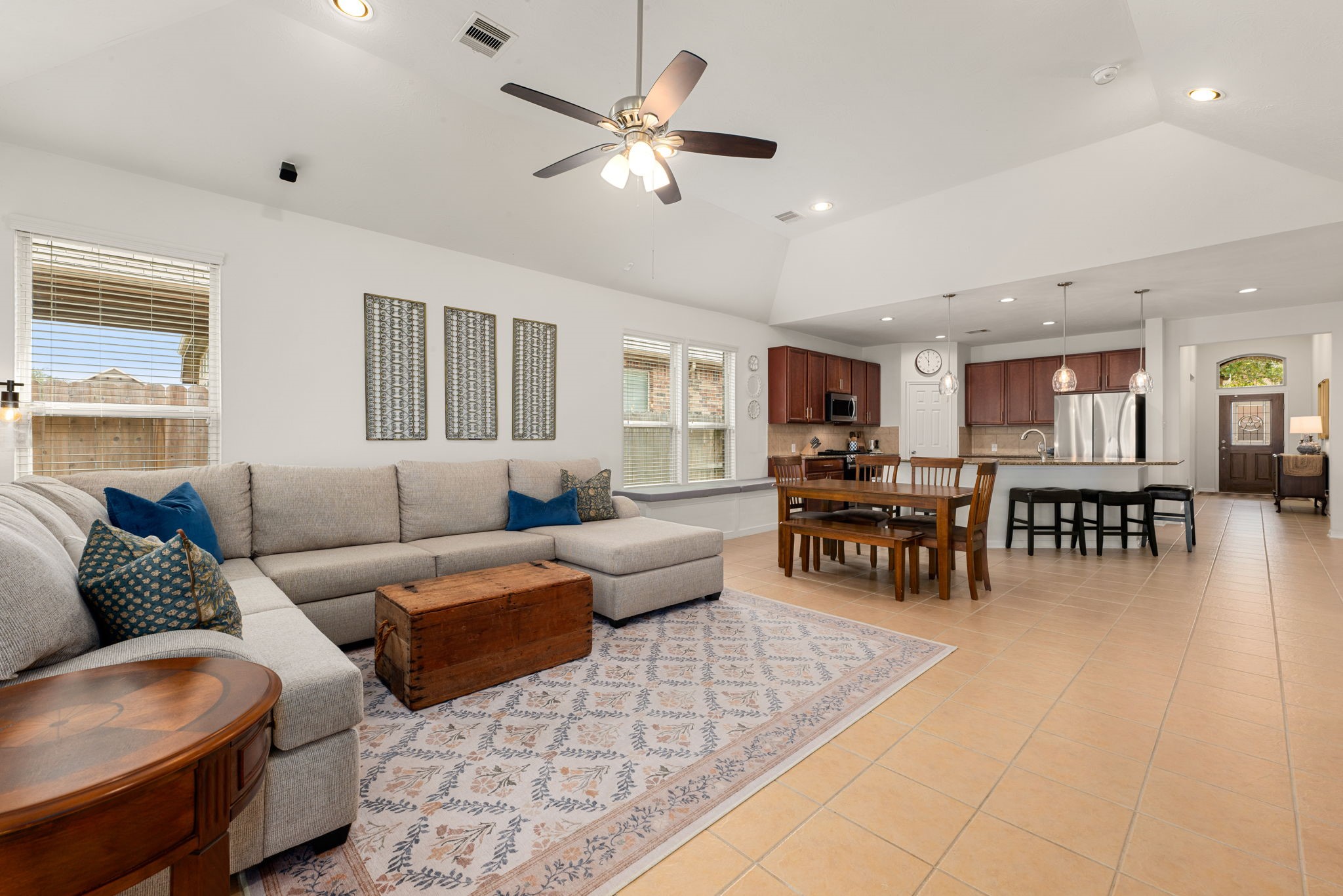 24014 Adobe Ridge Lane Katy, TX 77493 - Photo 17 of 45 a living room with furniture and kitchen view