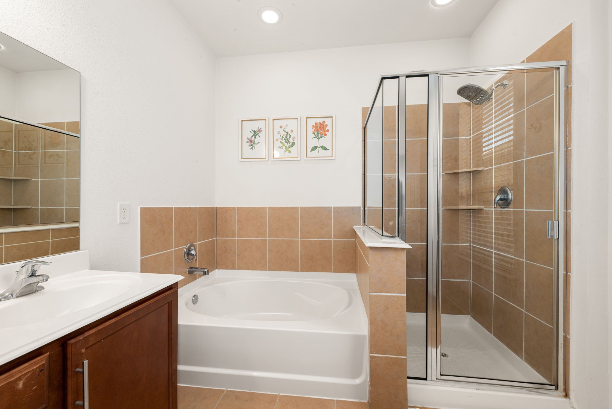 24014 Adobe Ridge Lane Katy, TX 77493 - Photo 23 of 45 a bathroom with a bathtub and a sink