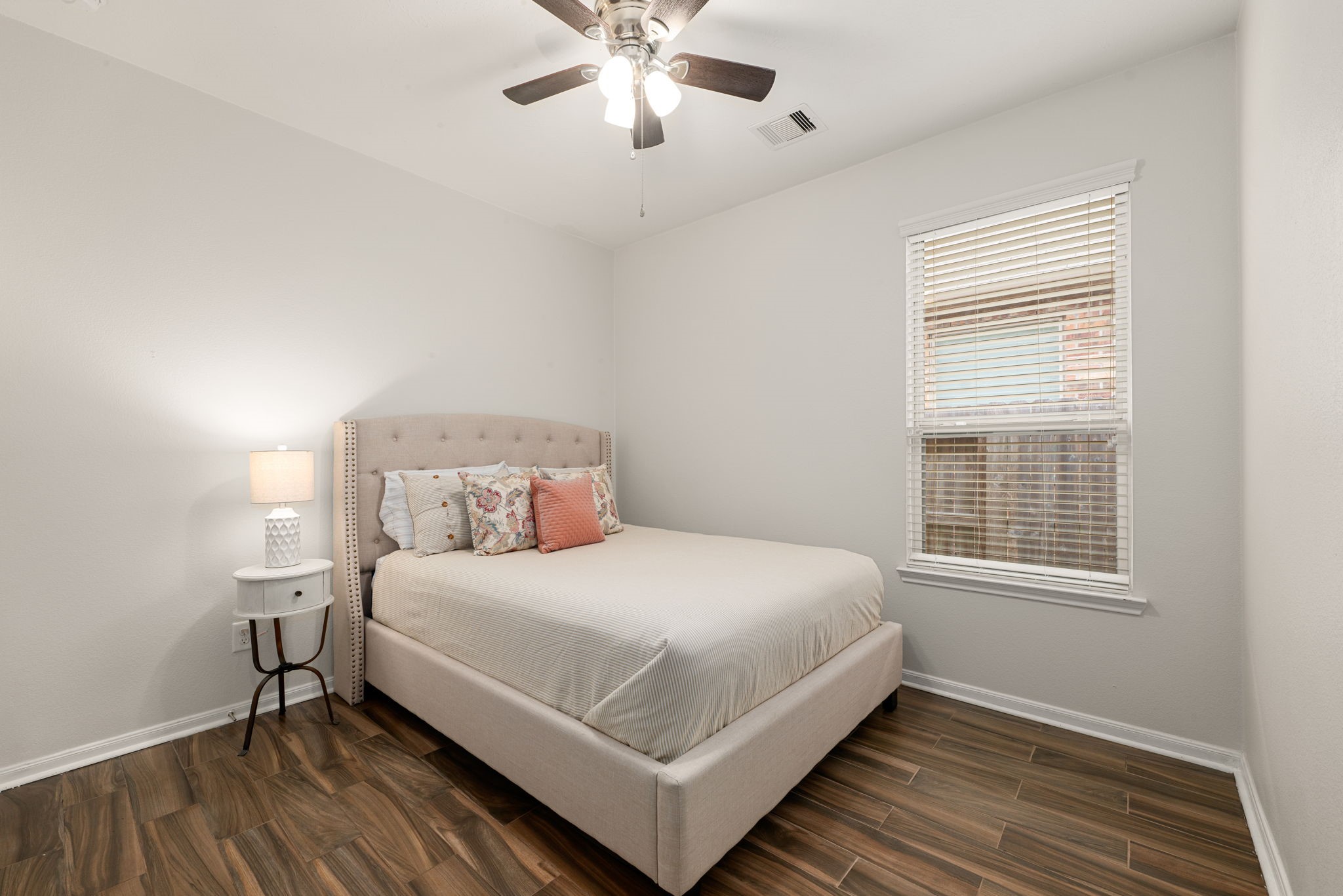 24014 Adobe Ridge Lane Katy, TX 77493 - Photo 26 of 45 a bedroom with a bed and a window