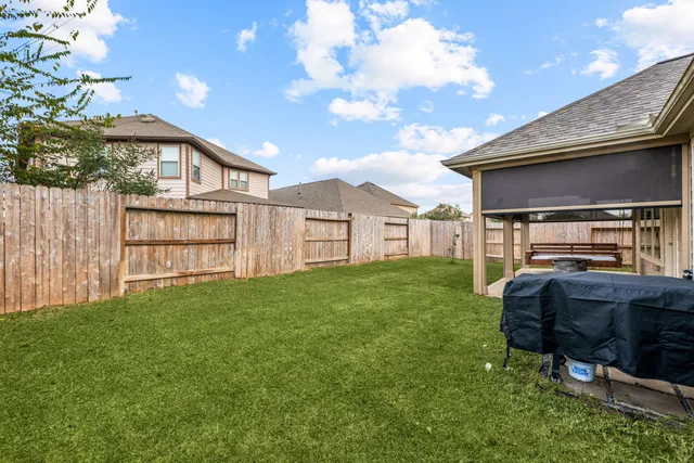 a view of a porch with a yard