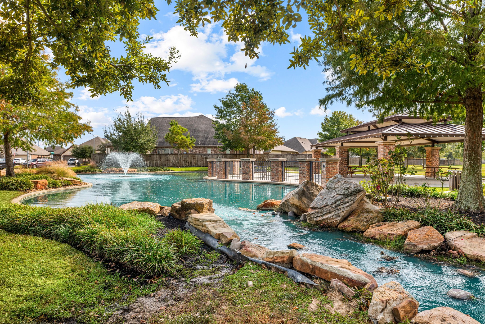 24014 Adobe Ridge Lane Katy, TX 77493 - Photo 35 of 45 a view of a lake with houses
