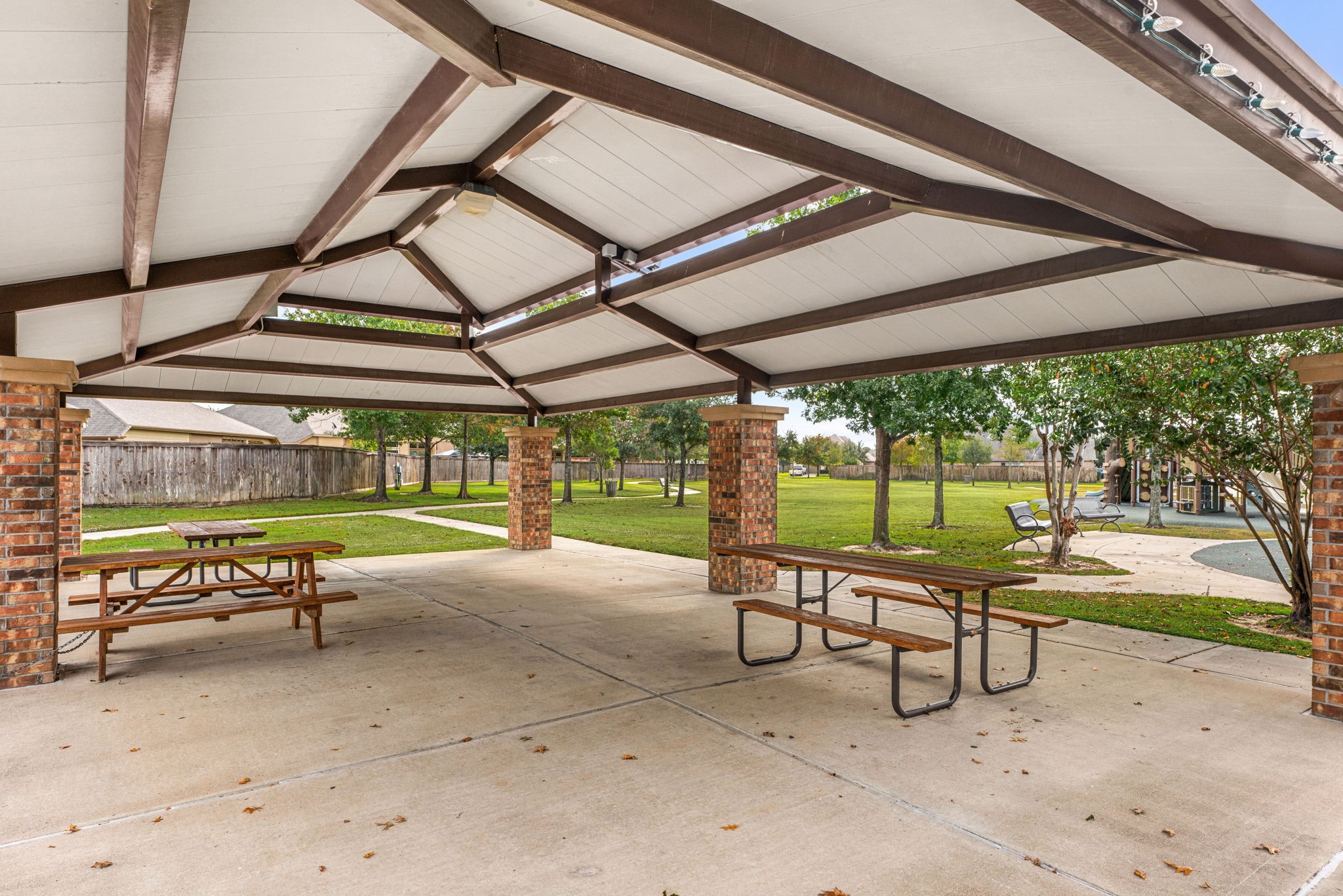 24014 Adobe Ridge Lane Katy, TX 77493 - Photo 37 of 45 a view of a swimming pool with a lounge chairs