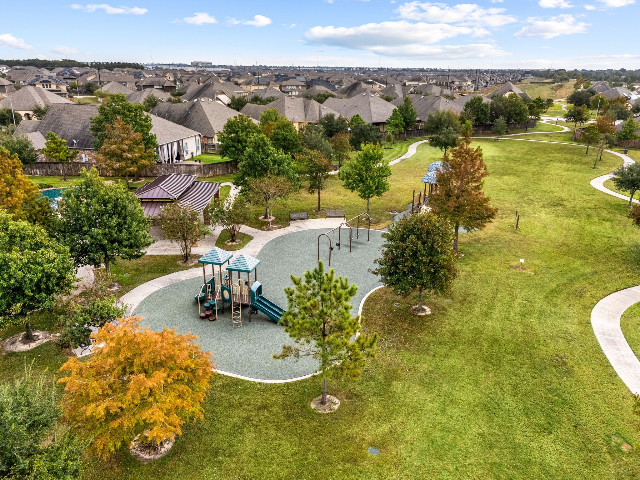24014 Adobe Ridge Lane Katy, TX 77493 - Photo 38 of 45 an aerial view of residential houses with outdoor space