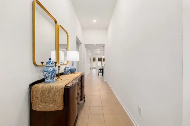 a hallway with view of living room