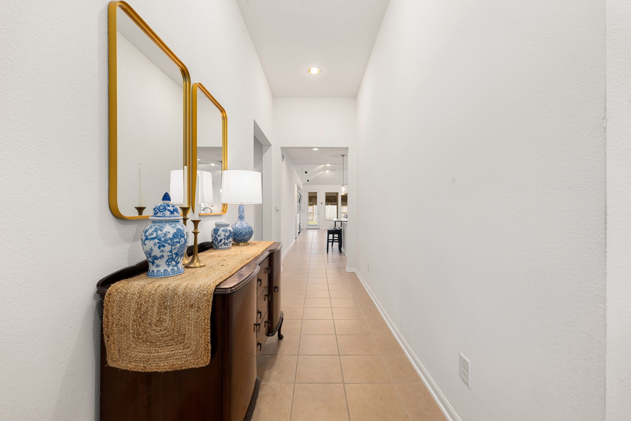 24014 Adobe Ridge Lane Katy, TX 77493 - Photo 6 of 45 a hallway with view of living room